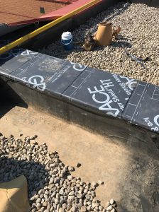 Ice and water shield membrane on flat roof Ajax
