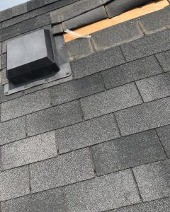 Windstorm damage to shingle roof in Ajax