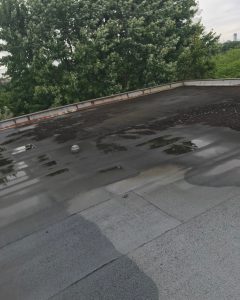 Excessive ponding of water on flat roof in Toronto
