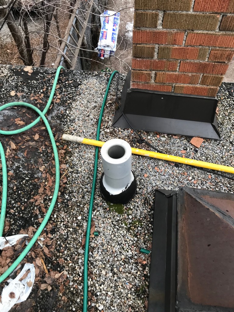 Aluminum spun 3-inch stack jack on commercial flat roof in Toronto