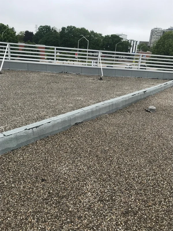 Torch applied membrane to control joint on commercial roof in Burlington