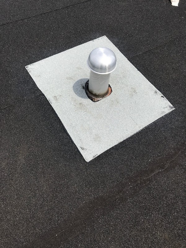 New insulated breather vent installed on flat roof in Scarborough