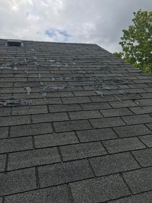 Shingle roof repairs on home in Scarborough with mastic