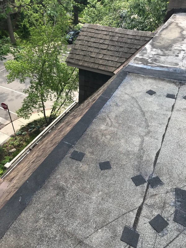 Flat roof repairs at drop flashing with mineral surfaces cap sheet in Toronto