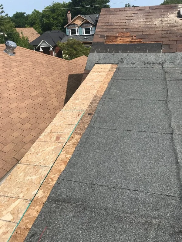 New 5/8 particle board sheathing installed on flat roof in Toronto