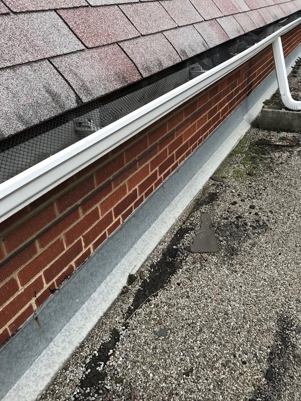 Metal flashing repairs on built up roofing system in Scarborough