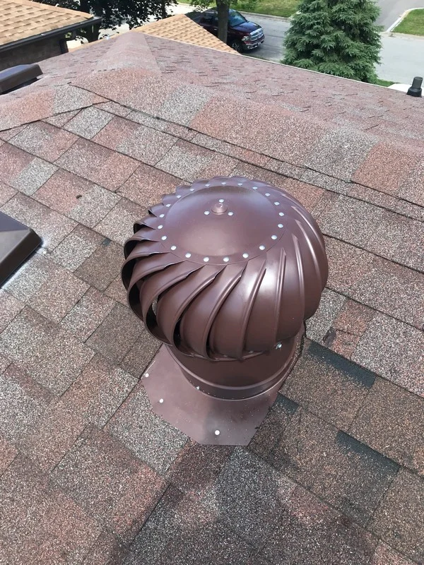 Whirley vent install on roof in Pickering