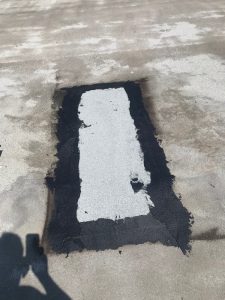 Commercial flat roof repairs using mineral surfaced bitumen in Scarborough